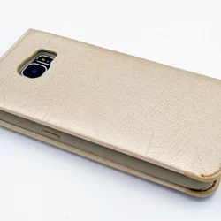 Telefontok UNIQ Kihajtható Tok Arany - Samsung Galaxy S7 (8719273222584)-1