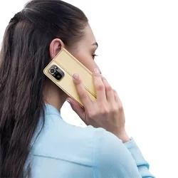 Telefontok Xiaomi Redmi Note 10 - Dux Ducis arany flipcover tok-1